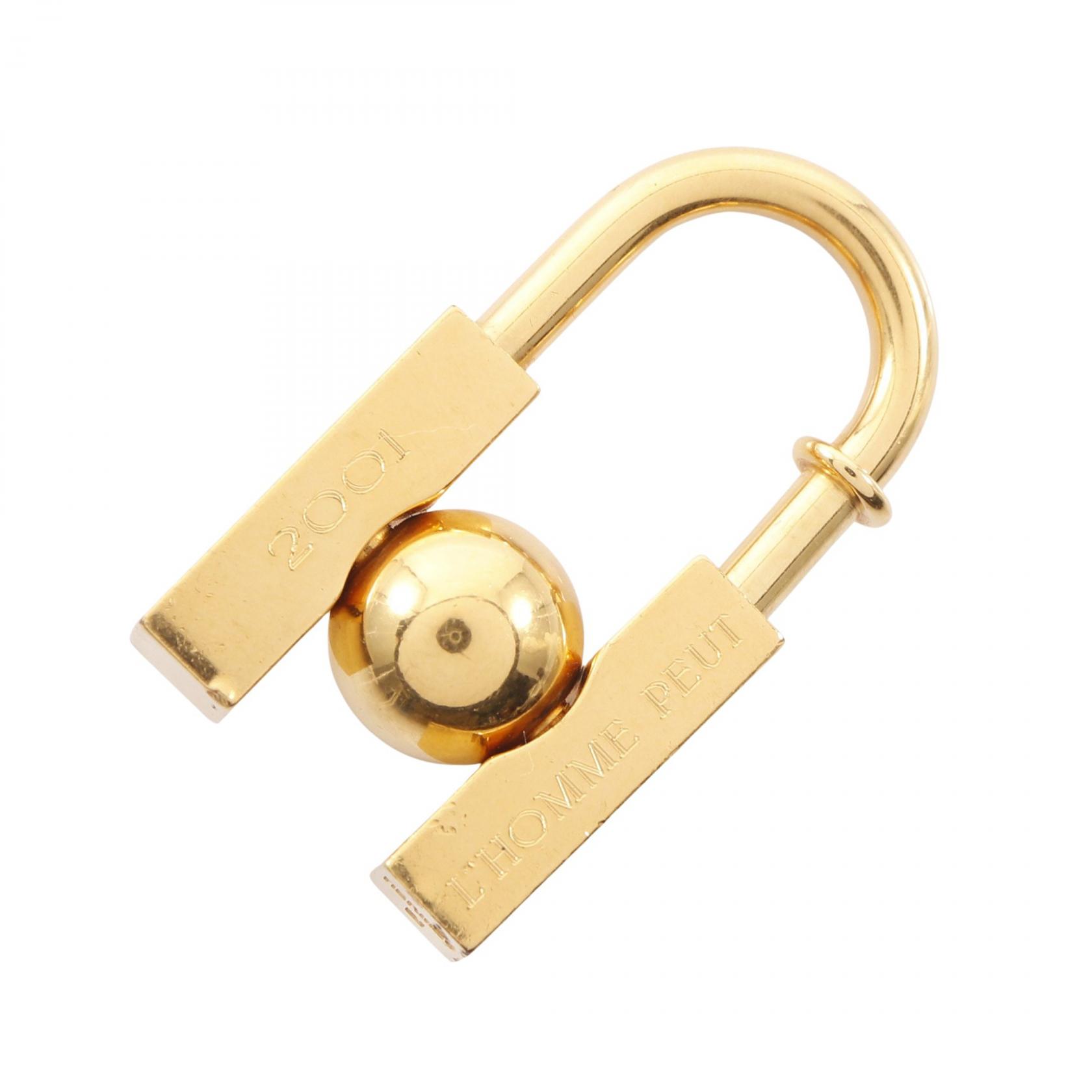 エルメス HERMES カデナチャーム L'HOMME PEUT EMBELLIR LA TERRE チャーム アクセサリー GP ゴールド..