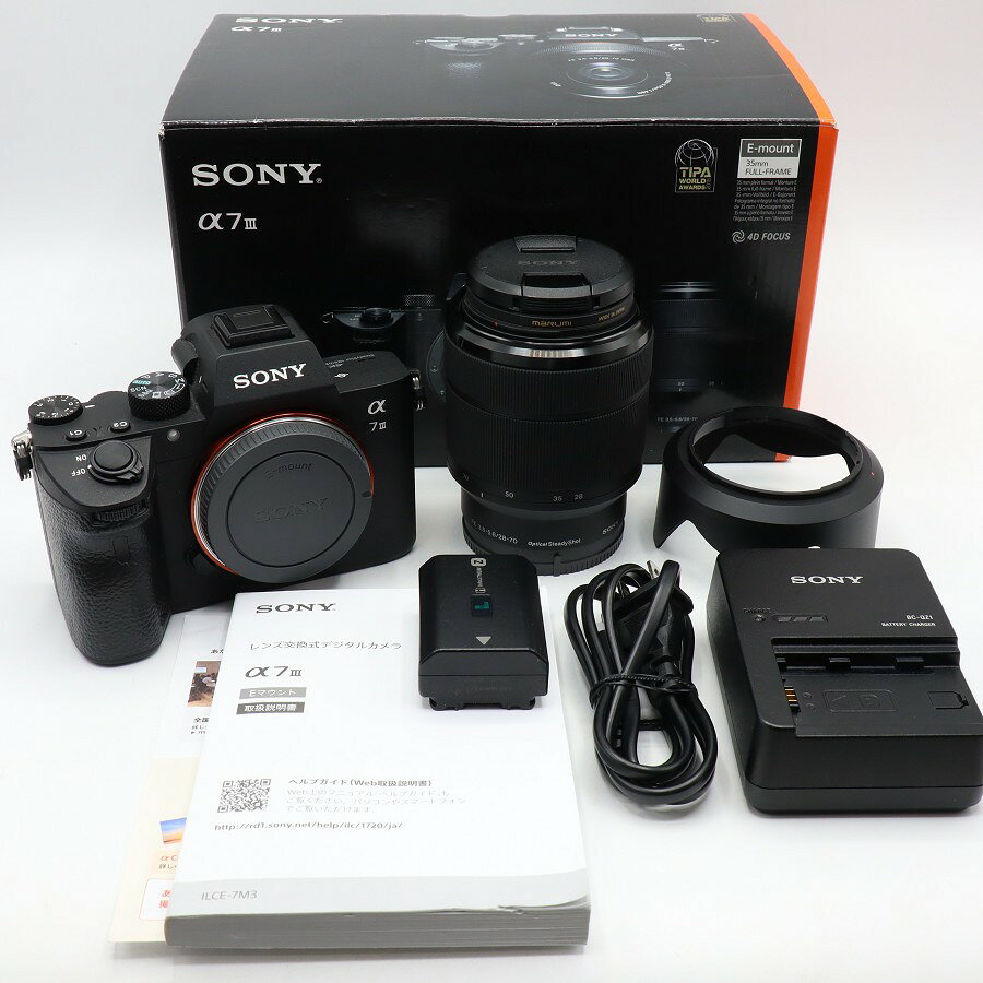 ■商品名 【美品】SONY α7 3 ILCE-7M3K ズームレンズキット ミラーレス デジタル一眼レフカメラ ソニー 本体 ■商品状態 【A】大きなダメージもなく程度良好の美品 ・本体に細かな擦れ感がございますが、全体的に状態の良い中古品です。 ・レンズ側面と付属品に使用に伴う擦れ感がございます。 ・アイピースカップ、ショルダーストラップ、マイクロUSBケーブルが欠品しております。 ・元箱のJANコード部分が切り取られた状態です。 ・動作確認済みのためご購入後はすぐにご使用いただけます。 ・自社で梱包して発送いたします。 ※付属品は画像にあるものが全てとなります。 ■元箱・説明書について ・元箱：あり ・説明書：あり ・保証書：なし ■商品ランク説明 当店が定める商品ランクは下記の商品状態からランク分けをおこなっております。 【N】未使用品 【S】数回使用程度の美品 【A】大きなダメージもなく程度良好の美品 【B】一般的な使用感のある商品 【C】傷、汚れがあり使用感を感じるUSED品 【D】傷・汚れなどが多く見受けられる難有品 【E】ジャンク品 ■発送について ・佐川急便でお支払い確認後、2営業日以内に発送いたします。 ※沖縄県及び離島のお客様はゆうパックでの【着払い】となりますので予めご了承ください。 ■古物商許可証 【大阪府公安委員会：第621010150412号】 ■ご購入の前にお読みください ・当店の明らかな商品説明の記載ミス等でない限り、ご購入後の返金・返品等の対応はできません。 ・ご購入後、3日以上ご連絡が取れないお客様につきましては、誠に勝手ながら購入の意思なしと判断し、キャンセル扱いとさせていただく場合がございますので予めご了承ください。 ■返金・返品について ・購入した商品と異なる場合 ・説明欄に記載のない大きなダメージがあった場合 ・サイズや記載と違うお色の場合 ・初期動作不良があった場合 上記の内容に該当する場合のみ返金・返品をお受けいたします。 ※若干の状態の違いなどの個人的主観、ご注文間違いやスペックの認識の相違、思っていた商品と違うなど、個人的な理由での返品はお受けできません。 ■商品番号 060986