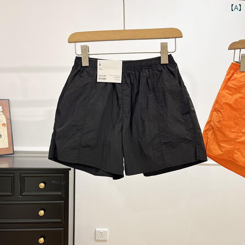 ・カテゴリ: 三分丈パンツ、セーフティパンツ・ウエスト: ハイウエスト・厚み: 薄手・カラー展開: ブラック、オレンジ、キャメル、草色・サイズ展開: S、M、L、XL・主な素材: ナイロン（化繊混紡）・主な素材の含有量: 30%以上50%未満・スタイル: 韓国系スタイル、日韓カジュアル・デザイン: 基本款・伸縮性: 弱ストレッチ・ディテール: パッチワーク、切り替え
