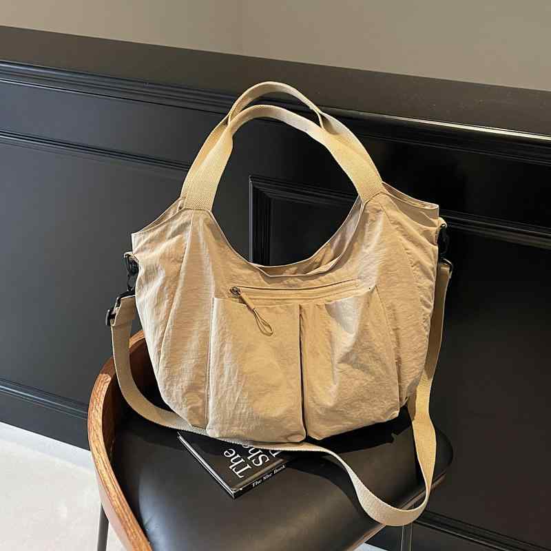 ・カラー展開: カーキ、ピンク、ブラック、イエロー、グリーン・スタイル: ストリートトレンド・素材: 布・バッグの形状: トートバッグ・サイズ: 大・流行要素: 縫い糸・裏地素材: ポリエステル・開閉方式: ファスナー・内部構造: 携帯電話ポケット・硬さ: やや柔らかめ・ショルダーストラップ本数: 1本・着用シーン: 日常