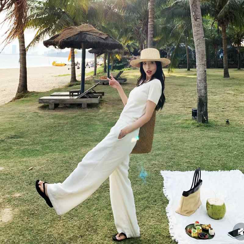 樂天商城 - レディース ワイドパンツ 白 夏用 高腰 ゆったり シルエット 直筒型 ロング 丈 薄手 コットンリネン 素材 通勤 スタイル 気質 ポケット 付き 垂れ感 ゆったり 履き心地 リラックス ファッション 日常 使い