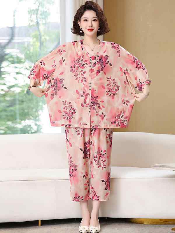 Other - レディース 短袖 Tシャツ 七分パンツ セット 接触冷感 涤纶 素材 花柄 プリント ポケット デザイン 橙 ピンク 紫 夏 ファッション 気質 通勤 スタイル ゆったり 大きいサイズ 女性 服 優雅 セブン分丈 袖 トップス ボトムス 組み合わせ 軽や