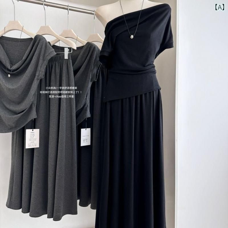 Other - レディース セットアップ 短袖 トップス 不規則 ヘム ニット スカート 長丈 夏服 荷葉辺 デザイン 気質 通勤 スタイル 都市 風 黒 灰色 セット 飛袖 超長袖 フライスリーブ スカートセット ゆったり シルエット 軽やか 素材 ブラック グレー