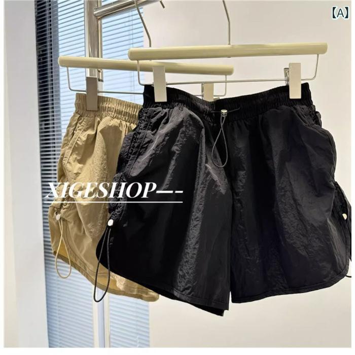 乐天商城 - レディース ショートパンツ 春夏 ワイドレッグ Aライン ゆったり 大きいサイズ 速乾 コットン混 伸縮性 黒 卡其 デイリー カジュアル デザイン性 百搭 工装風 抽绳 デザイン 軽量 快適 通勤 外出 普段使い 部屋着 アウトドア