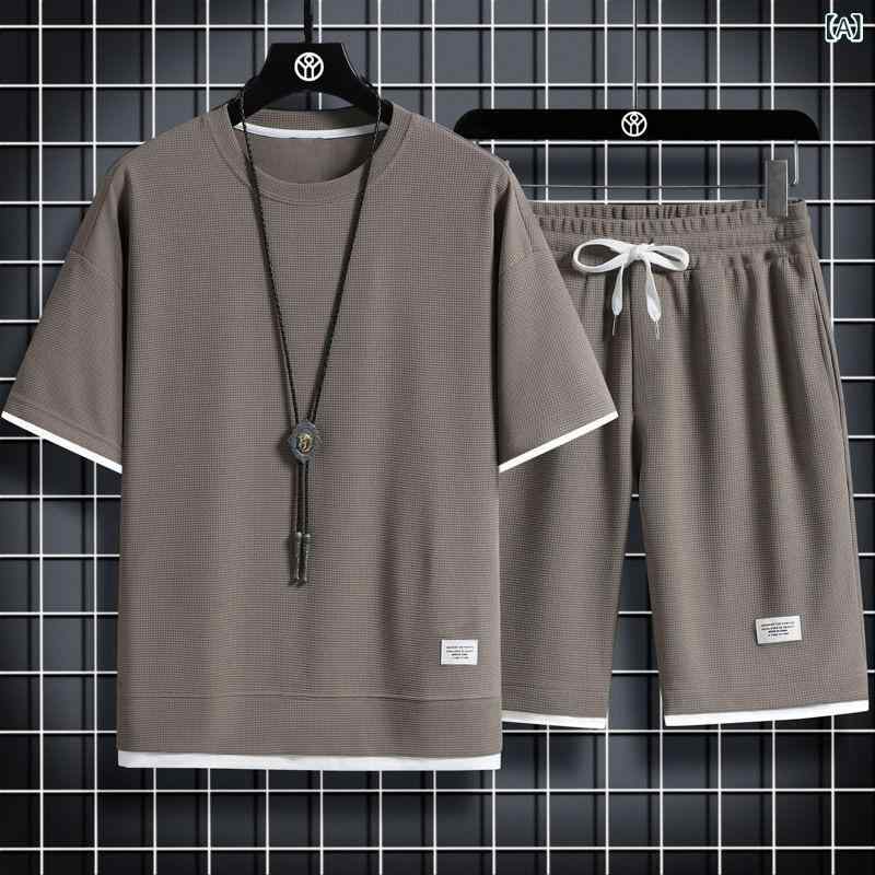 乐天商城 - メンズ Tシャツ 短パン セット 夏季 薄手 ワッフル素材 短袖 丸首 ポリエステル100％ 化繊混紡 快適 軽量 ゆったり フィット スポーツ スタイル 休日 屋外 グレー ブルー ブラック カーキ 夏用 18-24歳向け トレンド アイテム 涼しい