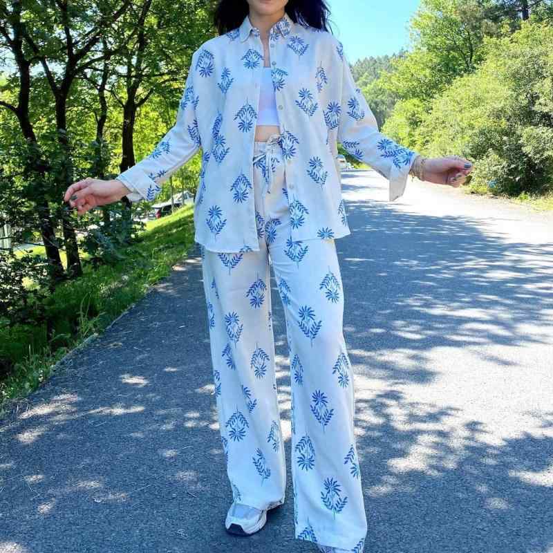 ・カテゴリ: 休闲套装・スタイル: 日韓休闲・主な素材: ポリエステル・柄: 植物花卉・カラー展開: 2014ブルー,2014グレー・サイズ展開: M,L,XL,XXL・袖丈: 長袖・パンツ丈: ロングパンツ・セットスタイル: パンツセット