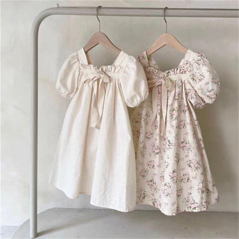 樂天商城 - キッズ ワンピース 女の子 男の子 泡泡袖 短袖 蝶結び プリーツ 中長丈 A字スカート コットン かわいい 純色 花柄 柔らかい 春夏 夏 90cm 100cm 110cm 120cm 130cm