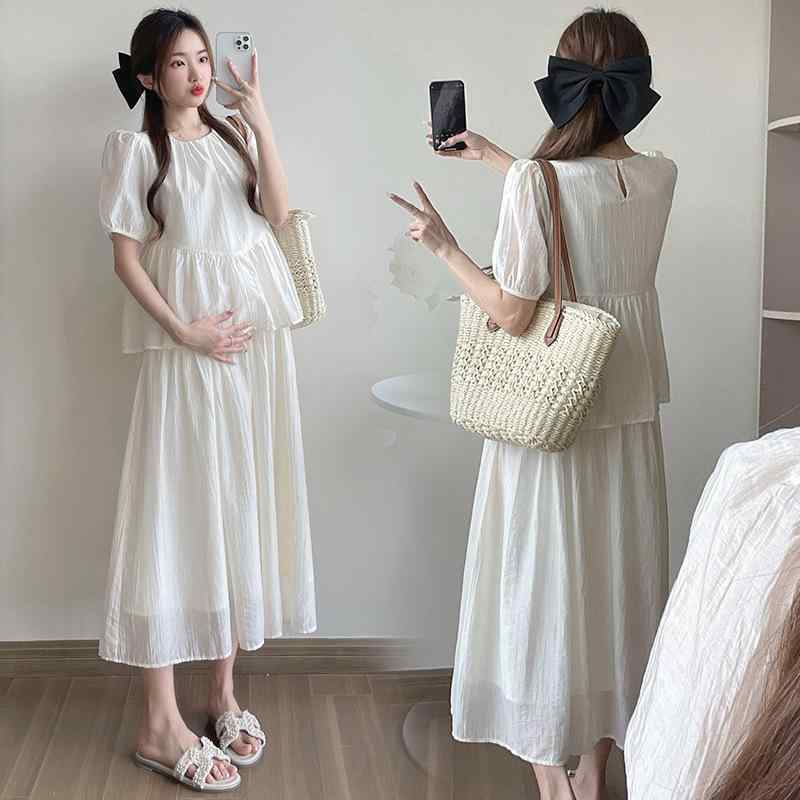 マタニティワンピース レディース 春夏 フェイクレイヤード ゆったり 高級感 かわいい 上品 お腹カバー 体型カバー 韓国風 オフィスカジュアル 通勤用 普段使い 膝丈 快適 柔らかい マタニティウェア["・カテゴリ: ワンピース","・ネックライン: ラウンドネック","・袖丈: 三分袖","・主な素材: ポリエステル","・柄: 無地","・スカート丈: ミドル丈","・サイズ展開: M, L, XL, 2XL","・スタイル: スウィート","・袖のタイプ: 通常","・スカートのタイプ: 切り替え","・素材感: 切り替え"]