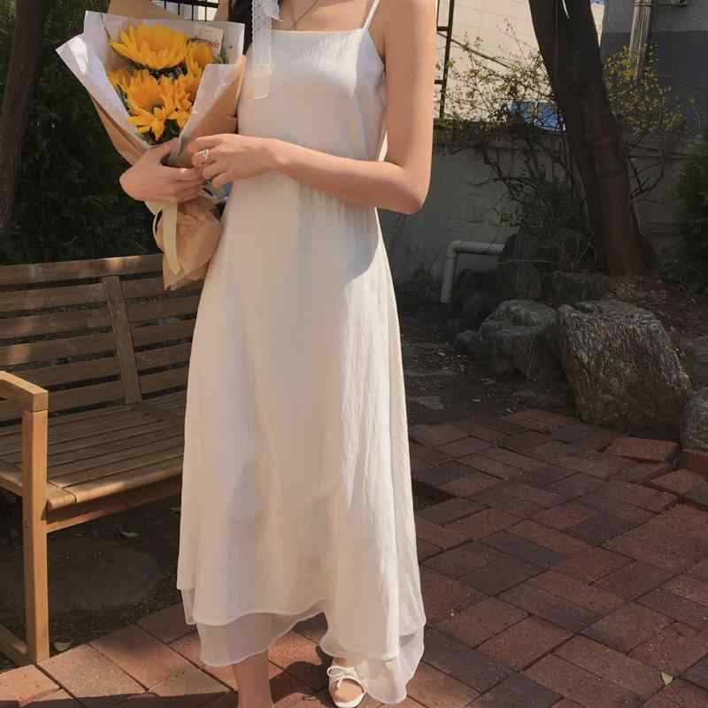 樂天商城 - ワンピース レディース 吊り帯 レイヤード レイヤースカート ミディ丈 無袖 米白 かわいい 甘め 春夏 2025年 春 デザイン 韓国風 チック 復古 芸術的 中国風 仙女 ポロ領 プリンセス袖 スカート ミドル