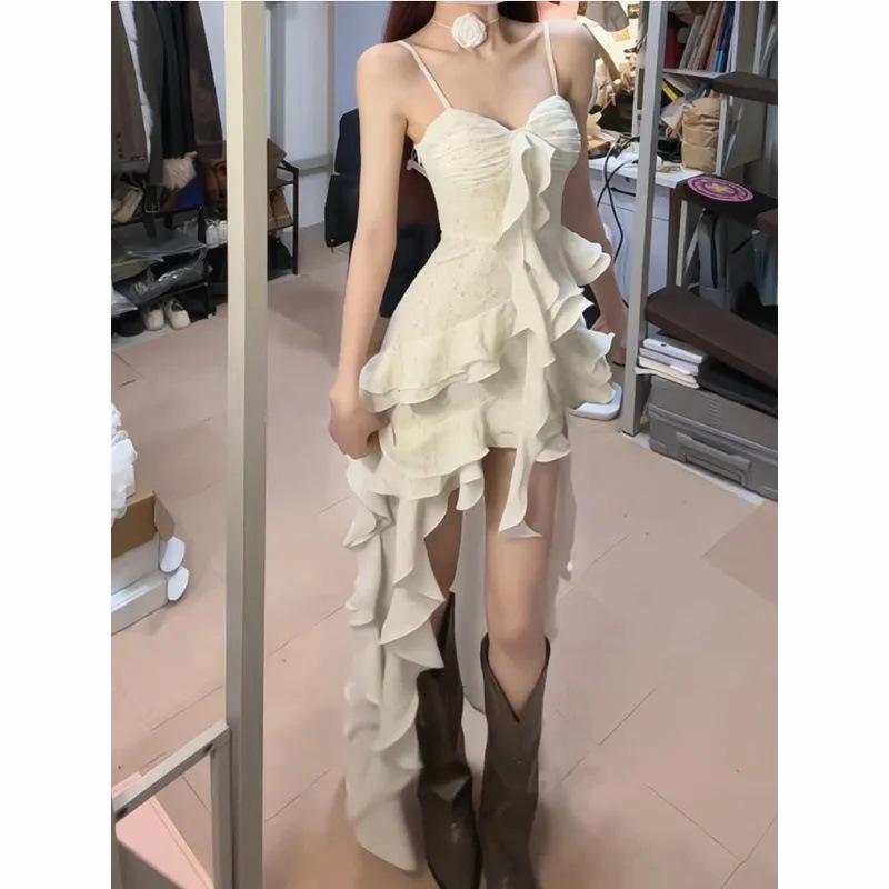 ・カテゴリ: 連衣裙・スタイル: 通勤風・主な素材: ポリエステル70-80%・袖丈: 無袖・スカート丈: ロング・スカートタイプ: フェアリースカート・ネックライン: フリルネック・袖タイプ: フリルスリーブ・ウエスト: ミッドライズ・人気要素: ヴィンテージ加工・カラー展開: 不規則フラワープリント・サイズ展開: S,M,L,XL,2XL
