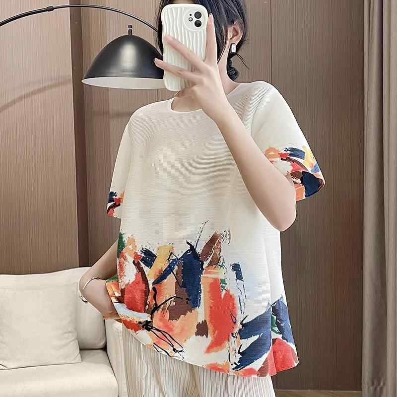 樂天商城 - Tシャツ レディース 春夏 短袖 トップス 丸首 ゆったり ワイド プリント柄 プリント加工 ポリエステル 95% 伸縮性 百搭 プリーツ 黒 孔雀藍 緑 杏 日常使い カジュアル 韓国風 快適 軽量 普通丈