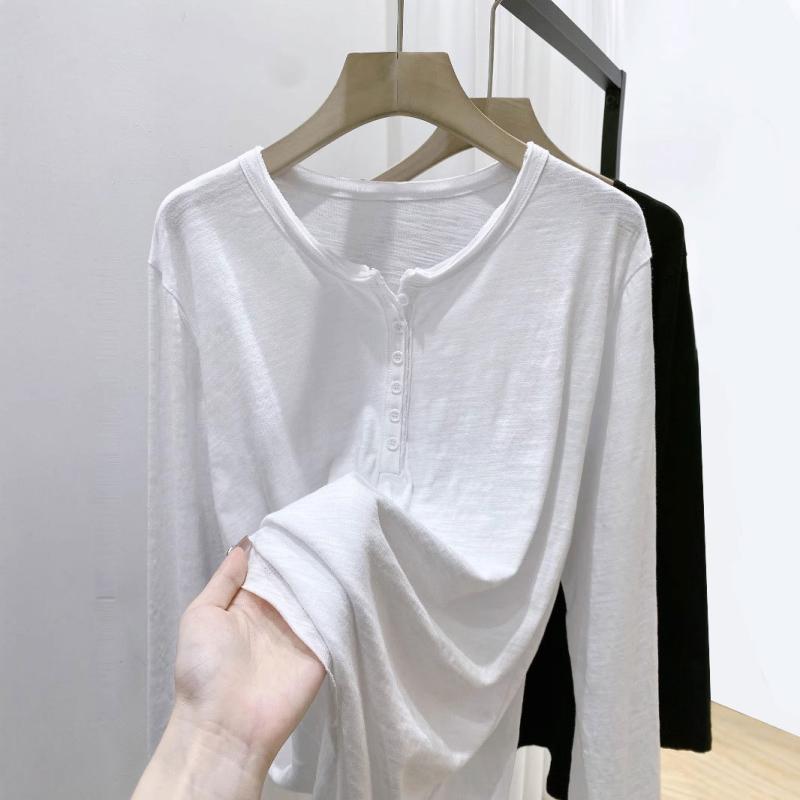 Tシャツ レディース 長袖 Vネック 綿 メッシュ素材 切り替えデザイン 竹節柄 純色 ボタン アクセサリー 気質 通勤風 秋冬 シーズン 白色 黒 ワイドシルエット ゆったり ルーズフィット 日常使い 百搭 トップス シャツ ブラウス 秋服 秋物 コッ