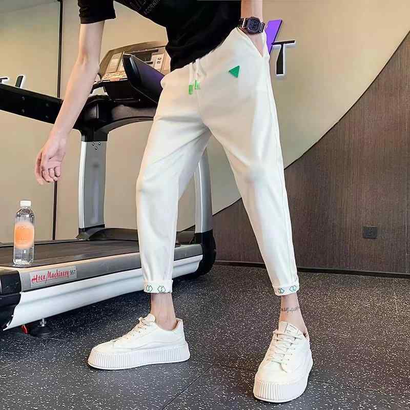 Rakuten - メンズ ハーレムパンツ 修身 束脚 九分丈 直筒型 中腰 薄手 化繊混紡 中弾力 黒 白 春夏秋冬 青春流行 休闲 痞帅 潮牌 直筒パンツ コーン型 青年向け ストリートファッション 軽量 快適 伸縮性 普段使い 通勤 通学 秋冬 春夏