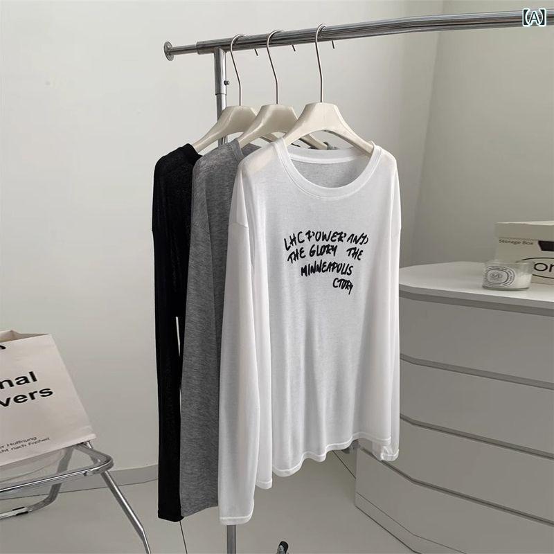Other - Tシャツ レディース 長袖 防風 夏 韓流 ルーズ 薄手 透け感 エアコン トップス ロングスリーブ 天竺 編み 文字柄 プリント セットインスリーブ シンプル 丸首 白 灰 黒 日韓 スタイル ゆったり 普通丈 季節 カジュアル