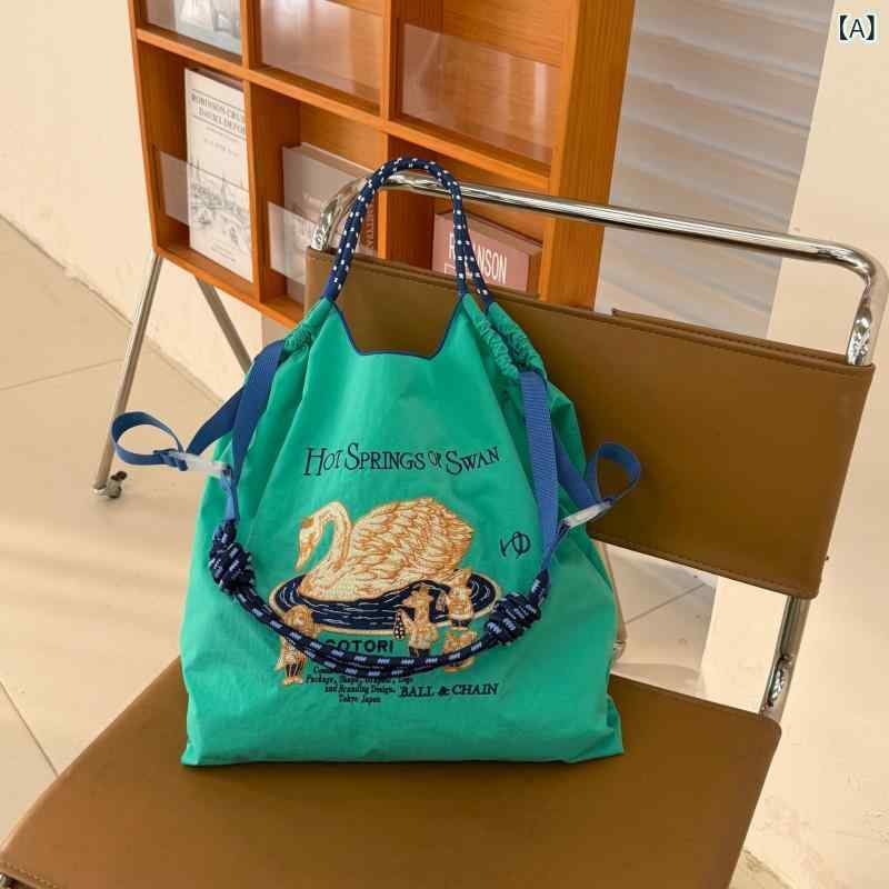 ・スタイル: 都市簡約・主な素材: ナイロン・カテゴリ: トートバッグ・サイズ展開: 中号、大号・形状: 縦型方形・開閉方式: オープニング・内部構造: 携帯袋、カードポケット・柄: 卡通・硬さ: 中偏軟・外ポケット: オープニングポケット・肩帶数: 単根・使用シーン: 日常
