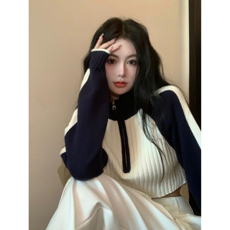 ニット セーター レディース 春夏 杏色 ピンク系 ベージュ系 切り替えデザイン 高腰 スタンドカラー ドロップショルダー ジッパー ショート丈 長袖 直筒シルエット 通勤風 気質スタイル 快適 単品 綿 ポリエステル 中厚 セットアップなし 純色 セッ