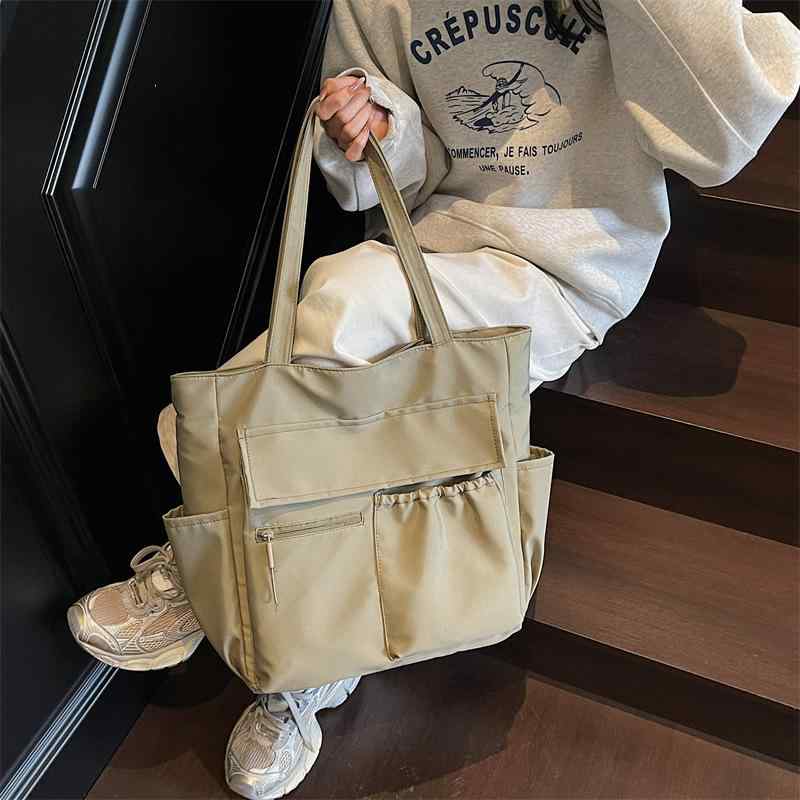 ・カラー展開: 米白色、緑、卡其色、黒・スタイル: クロスボーダー風潮・主な素材: 帆布・サイズ: 中・適用シーン: 日常・流行要素: 車縫線・裏地素材: ポリエステル・形状: 縦型方形・開閉方式: ジッパー・内部構造: 携帯ポケット・外部ポケット: サイドポケット・硬さ: ソフト・肩紐本数: 2本