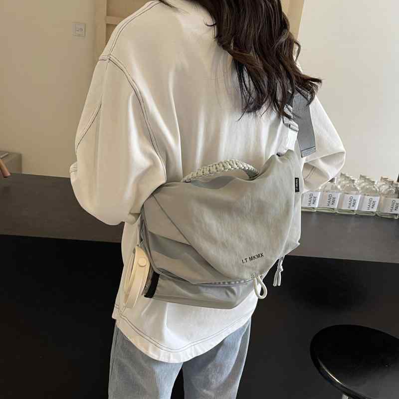 ・スタイル: 街頭潮流・主な素材: 帆布・カテゴリ: トートバッグ・サイズ: 中・形状: 横型・人気要素: 車縫線・内張り素材: ポリエステル・開閉方式: 磁扣・内部構造: 携帯ポケット・硬さ: 中偏軟・外ポケット: 内貼りポケット・肩紐本数: 1本・使用シーン: 日常使い・カラー展開: ブラック、グレー、ホワイト、イエロー、ライトブルー
