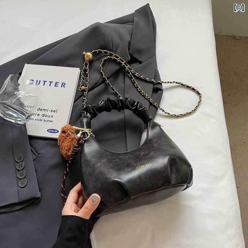 ・カラー展開: ブラック、コーヒー、ブラウン・スタイル: ストリートトレンド・素材: PU・バッグトレンドスタイル: クラウドバッグ・バッグサイズ: 小・トレンド要素: シャーリング・裏地素材: ポリエステル・バッグ形状: 横型スクエア・開閉方法: ファスナー・バッグ内部構造: ファスナーポケット、カード・証明書用ポケット・硬度: やや柔らかめ・外ポケットの種類: 内パッチポケット・ショルダーストラップ本数: 1本・適用シーン: 日常コーディネート