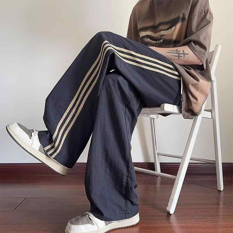 乐天商城 - ロングパンツ メンズ 接触冷感 速乾 ボトムス ズボン 長ズボン スポーツウェア 運動 普段使い 日常 カジュアル 港風 アメカジ ゆったり ストレート ワイド ルーズ ドローストリング 薄手 軽い 軽量 伸縮性 耐摩耗性 ポリエステル ブラック カーキ