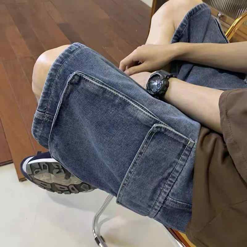 ショートパンツ メンズ 男性用 短パン ハーフパンツ デニム ジーパン 五分丈 ワークパンツ カーゴパンツ ポケット付き ゆったり ワイドシルエット カジュアル ストリート系 アメカジ 水洗い加工 薄手 夏物 普段着 通学用 お出かけ用・スタイル: 港風・款式: 工装パンツ・カテゴリ: ファッション・パンツシルエット: ルーズ・特殊加工: ウォッシュ加工・パンツ丈: 五分丈/中丈・ウエスト: ミドルウエスト・厚さ: 普通・誤差範囲: 2-3cm・素材: ポリエステル繊維（テリレン）70%・用途: 日常・デザイン詳細: マルチポケット・伸縮性: なし・裾のスタイル: ストレート・加工: 形態安定加工・カラー展開: 深藍色, 浅藍色, ブラック・サイズ展開: M, L, XL, XXL, XXXL, 4XL, 5XL・年齢層: 大人・性別: メンズ・製品カテゴリ: ジーンズ