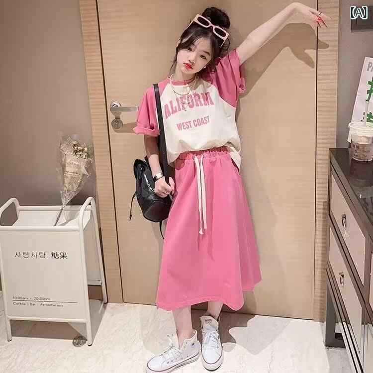 ・カテゴリ: 子供服セット・性別: レディース（キッズ）・スタイル: 韓国風・セット内容: スカートセット（2点セット）・対象年齢: 中大童（8歳以上、140cm以上）・袖丈: 半袖・フード: なし・厚み: 普通・柄: 英字、プリント、バイカラー・主な素材: 綿35%・開閉仕様: プルオーバー・カラー展開: ピンク、ネイビー・推奨身長: 120cm、130cm、140cm、150cm、160cm、170cm