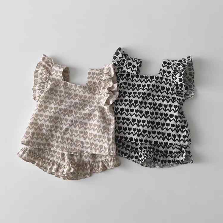 ・カテゴリ: 子供用セットアップ・対象性別: 女の子・スタイル: 韓国風・セット内容: トップス、パンツ（2点セット）・袖丈: 半袖・フード: なし・パンツ丈: ショートパンツ・生地加工: ソフト加工・厚さ: 普通・柄: 花柄・主な素材: 綿100%・安全基準: Aクラス・留め具の種類: シングルブレスト・カラー展開: ブラック、カーキ・対応身長: 73cm、80cm、90cm、100cm