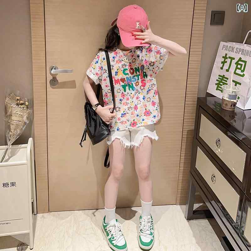 ・カテゴリ: 子供用セットアップ・対象性別: 女・スタイル: 韓国風・セット内容: トップス、パンツ・セット数: 2点セット・対象年齢: 中高学年以上（8歳以上、140cm以上）・袖丈: 半袖・フード: フードなし・パンツ丈: ショートパンツ・生地加工: 柔軟加工・厚さ: 薄手・柄: 無地、花柄・デザイン要素: セットアップ、プリント、トレンド・素材: 綿混紡・主な素材成分: 綿60%・安全基準: B類・留め具の種類: プルオーバー・カラー展開: フラワー半袖トップス（単品）、ホワイトショートパンツ（単品）、フラワートップス&amp;ホワイトパンツセット・サイズ展開: 130cm、140cm、150cm、160cm、170cm