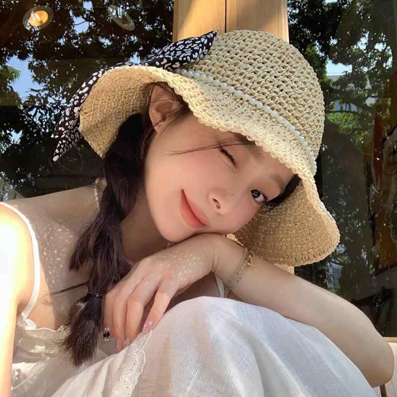 ・カテゴリ: 草帽・デザイン: 蝴蝶结・柄: 纯色, 印花・帽頂スタイル: 圆顶・つばのスタイル: 大檐・カラー展開: 米色, 卡其色・サイズ展開: M（56-58cm）・機能: 透气, 遮阳・仕様: 可调节, 可折叠・スタイル: 日韩, 甜美, 田园风, 度假风, 韩版韩式, 小清新・素材: 草编・スタイル分類: 清新甜美・加工技術: 手工编织