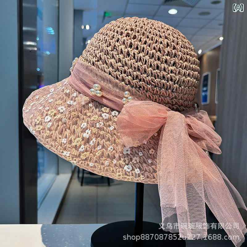 ・カテゴリ: 草帽・デザイン: 蝶結び・帽子のトップデザイン: 丸型・帽子のつばデザイン: 広つば・カラー展開: ピンク、カーキ、ベージュ・サイズ展開: M（56-58cm）・機能: 防寒、通気性、日よけ・スタイル: シンプル、ファッション・素材: ペーパー