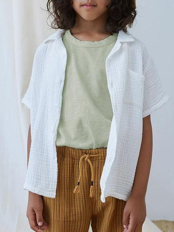 ・カテゴリ: 子供用Tシャツ・対象性別: 男女兼用・スタイル: シンプル・フード: なし・袖丈: ノースリーブ・対象年齢: 中小童（3〜8歳、100〜140cm）・生地加工: 酵素洗い・柄: 無地・デザイン要素: 田園風・主な素材: 綿100%・安全基準: B類・ネックライン: クルーネック・機能: 吸湿速乾・カラー展開: ホワイト、ピンク、グリーン、マスタードイエロー・サイズ展開: 90cm、100cm、110cm、120cm、130cm