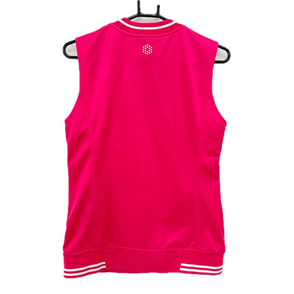 【超美品】プーマ アウターベスト ピンク×白 前面総柄 Vネック レディース L ゴルフウェア PUMA