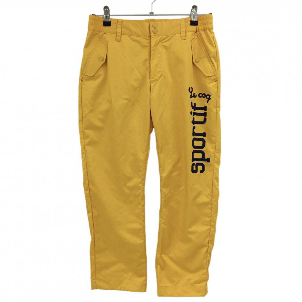 ルコック 半端丈パンツ イエロー フラップポケット ロゴプリント レディース 9 ゴルフウェア le coq sp..