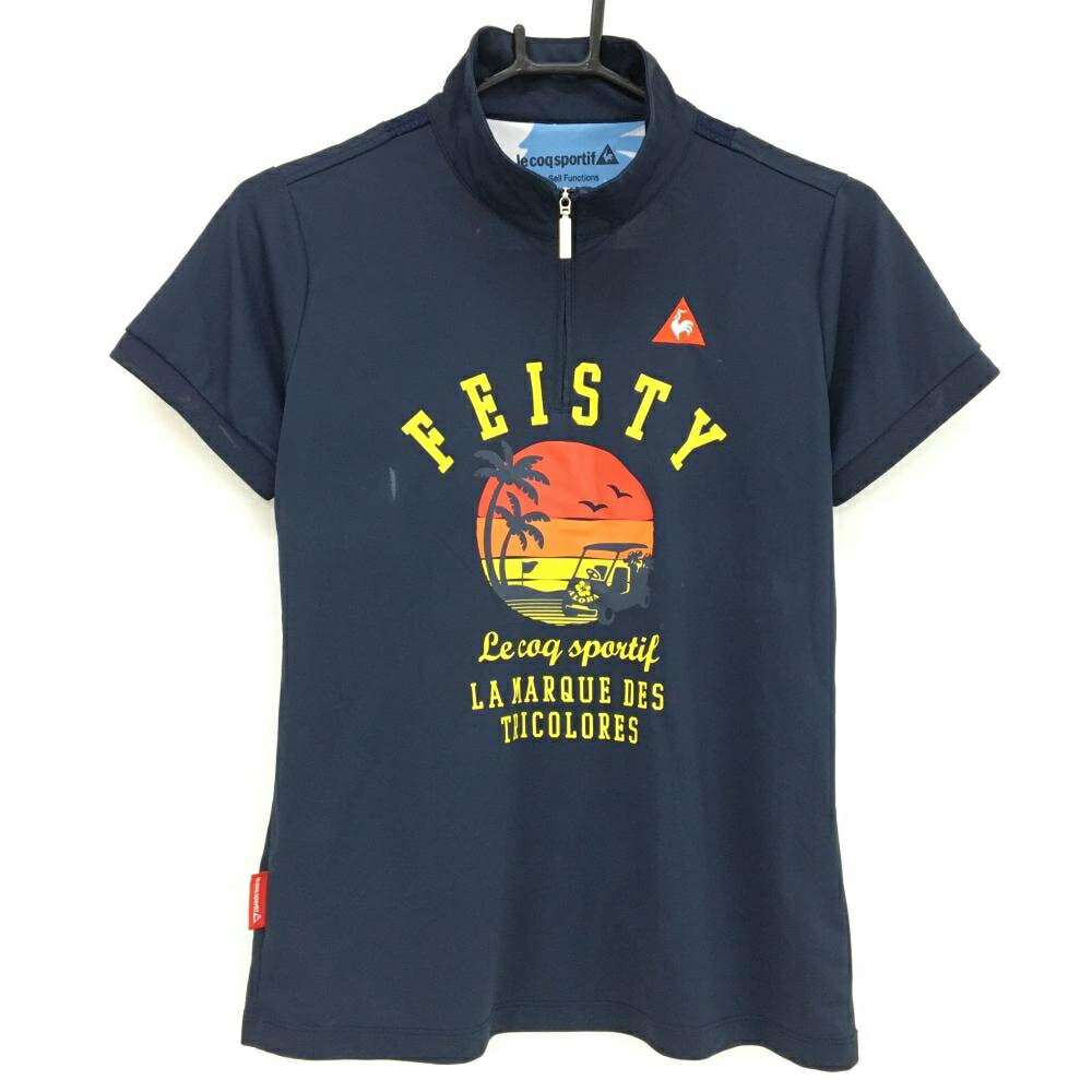 【当店ポイント5倍！6/4 20:00〜6/11 1:59まで】ルコックゴルフ 半袖ハイネックシャツ ネイビー×イエロー 夕景プリント ハーフジップ レディース L ゴルフウェア le coq sportif