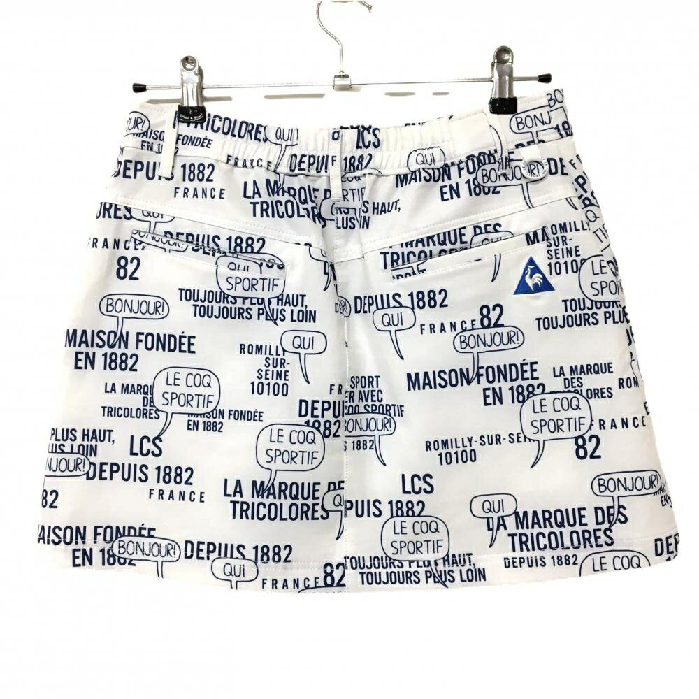 【美品】ルコックゴルフ スカート 白×ネイビー 英字総柄 ストレッチ レディース 11 ゴルフウェア le coq sportif