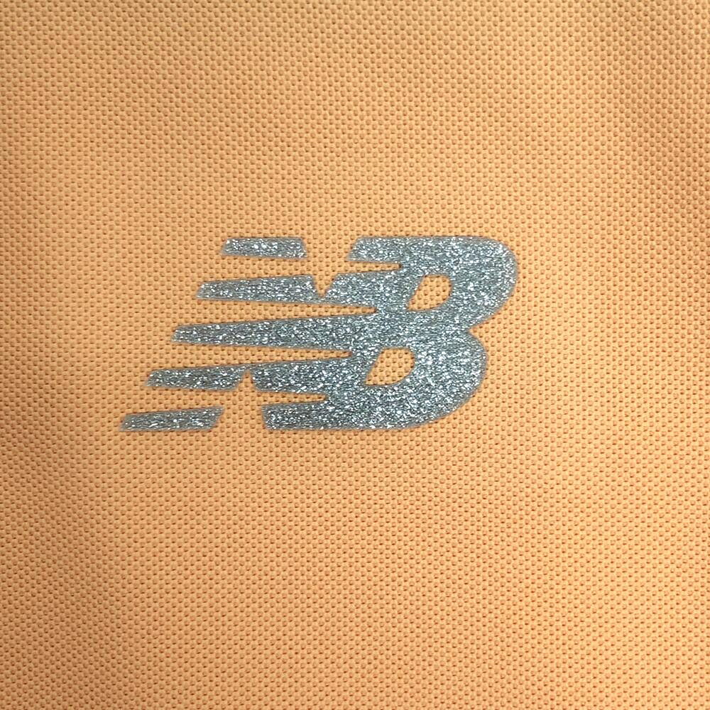 【超美品】ニューバランスゴルフ ノースリーブポロシャツ オレンジ×白 肩一部ロゴ...