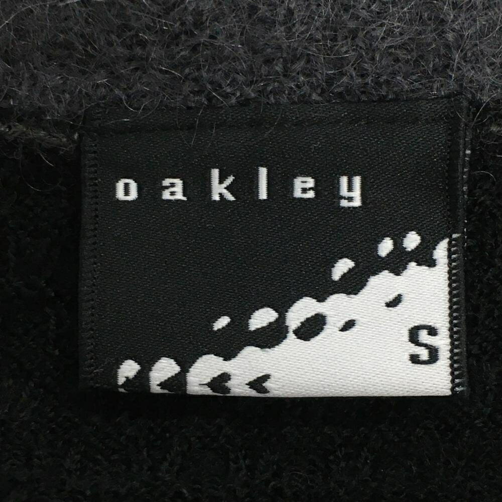 【美品】オークリー ニットベスト 黒 ロゴ刺しゅう レディース S ゴルフウェア Oakley