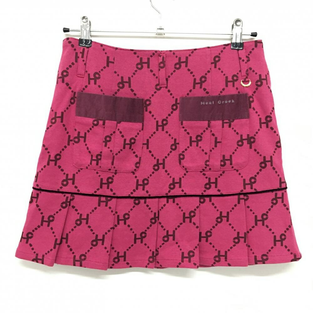 【美品】ヒールクリーク スカート ピンク×ボルドー ロゴ総柄 裏地付 裾プリーツ 毛羽立ち少 レディース 40(M) ゴルフウェア Heal Creek