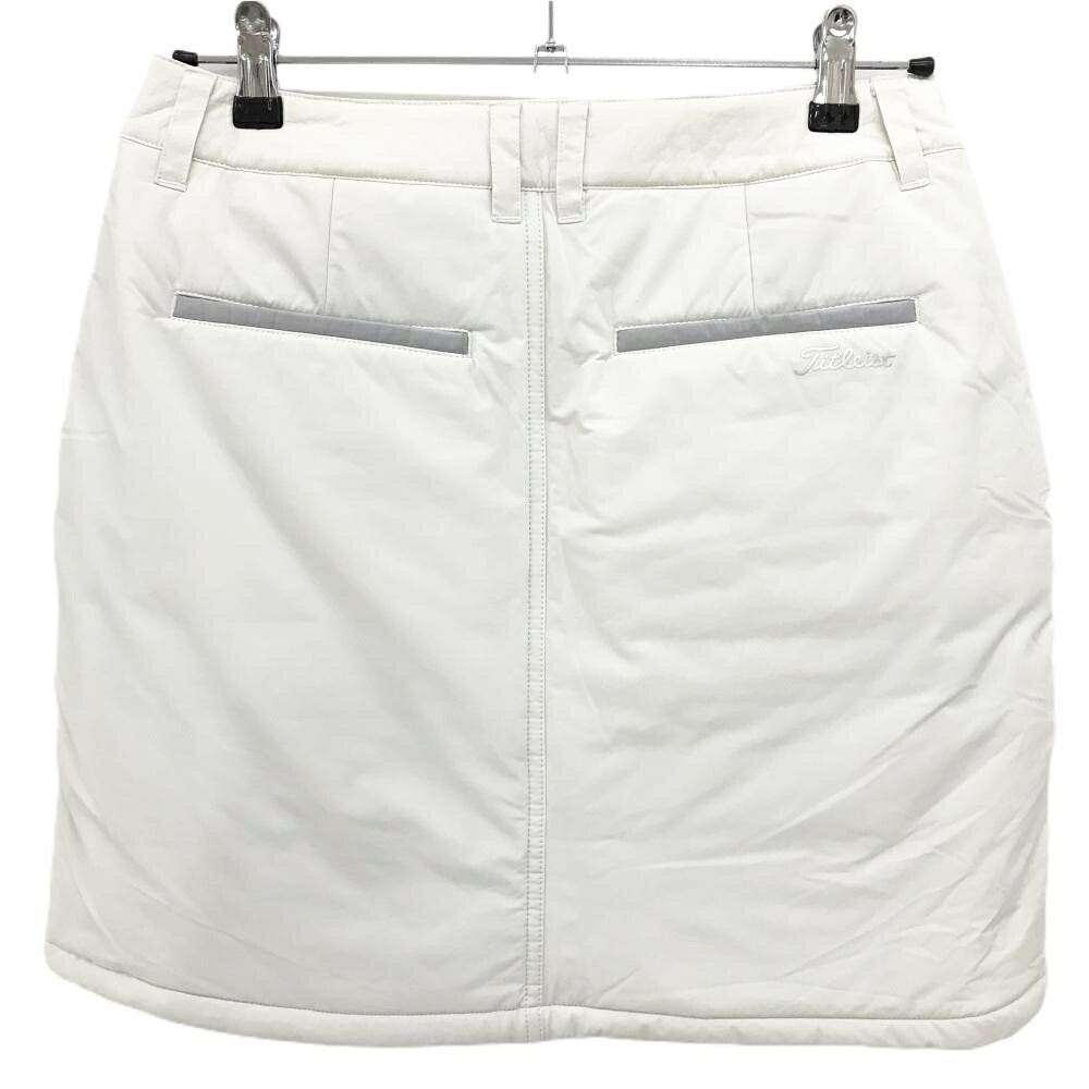 【美品】タイトリスト 中綿巻きスカート 白 前ボタン ポリウレタンフィルムラミネーション レディース L ゴルフウェア TITLEIST