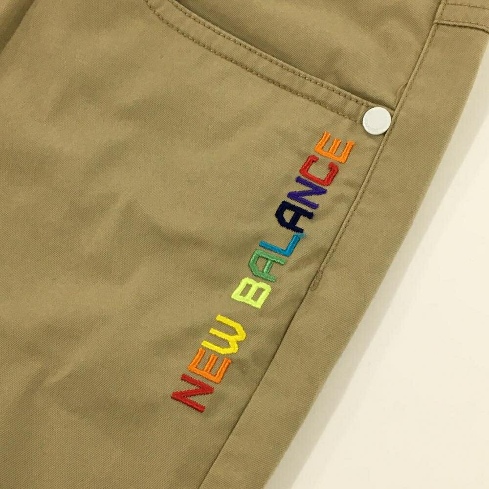 【美品】ニューバランスゴルフ 七分丈パンツ ベージュ ロゴマルチカラー レディース 1(M) ゴルフウェア New Balance