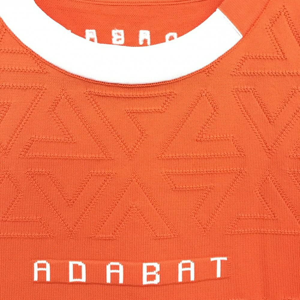 【超美品】アダバット ニットベスト オレンジ 前総柄織生地 サイドライン白 レディース M ゴルフウェア adabat