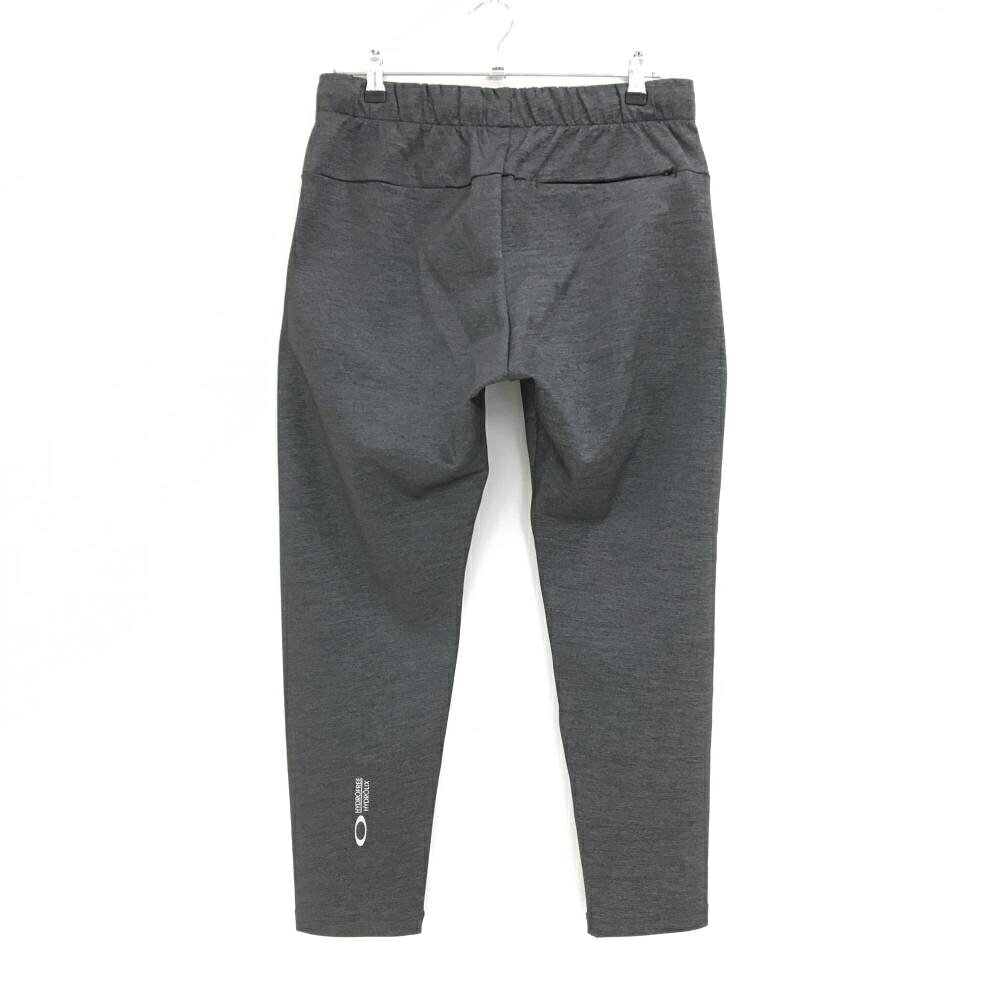 【超美品】オークリー パンツ 杢ダークグレー サイドロゴ メンズ M ゴルフウェア Oakley