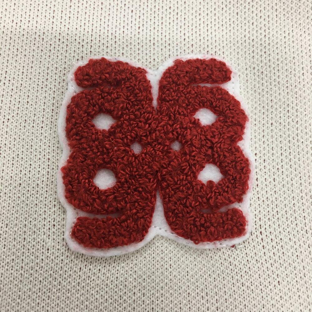 【超美品】アルチビオ ニットベスト 白×レッド バックロゴ さがら刺しゅうワッペン レディース 36(S) ゴルフウェア 2024年モデル archivio