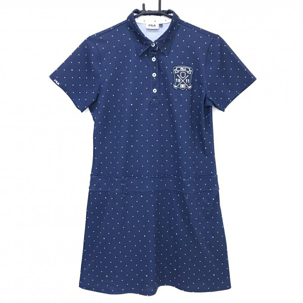 商品説明 ブランド FILA GOLF アイテム 半袖ポロワンピース 表記サイズ L ※海外サイズの場合もございます。必ず実寸サイズをご確認ください。 実寸サイズ 　身幅：約47cm　袖丈：約18cm　肩幅：約39.5cm　着丈：約84cm ※実寸サイズの採寸方法については、こちらをご覧ください。 ★実寸サイズは平台に平置きして外寸を測定しており、商品によっては若干の誤差が生じます。数cmの誤差は予めご了承くださいませ。 特徴・仕様 適応時期 春 ・ 夏 商品ランク B+ コメント ネック・ヒップ汚れ、袖口毛羽立ち小 商品ランク（ゴルフウェア） N 新品（タグ付き) S 新品未使用品（タグなし） A+ 使用感や汚れ等がない、または目立たない綺麗な中古品 A 使用感や汚れ等が少ない美品や良品 B+ 使用感や中小の汚れ等がある一般的な中古品 B 使用感や大中の汚れ等がある一般的な中古品 C 使用感や大中の汚れ、小さな穴等がある中古品 商品ランク（ゴルフシューズ） N 新品（タグ付き) S 新品未使用品（タグなし） A+ しわや汚れ等がない、または少ない綺麗な中古品 A しわや小さな汚れはあるが、使用感が少ない美品や良品 B+ しわや中小の汚れ、使用感がある一般的な中古品 B しわや大中の汚れ、使用感がある一般的な中古品 C しわや大中の汚れ、使用感がある中古品 D しわや大きな汚れ、使用感がある中古品 &nbsp;★A+～CランクはUSED品となりますので、神経質な方はご入札をお控えください。 &nbsp;★Nランクは新品商品ですが、一部保管時による汚れ等があります。商品説明や写真で必ずご確認ください。　