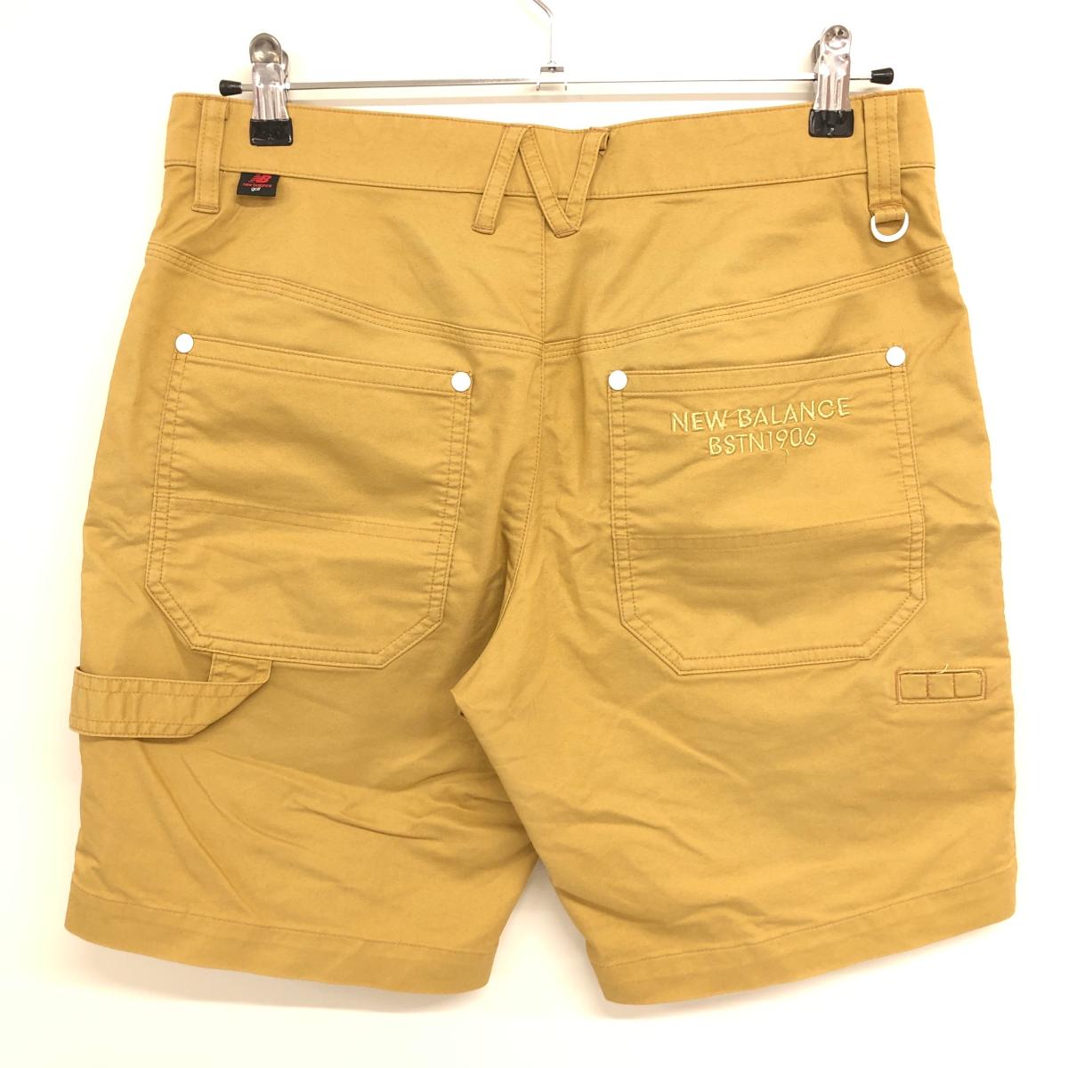 【美品】ニューバランスゴルフ ハーフパンツ ブラウン系 ロゴ刺しゅう メンズ 4(M)...