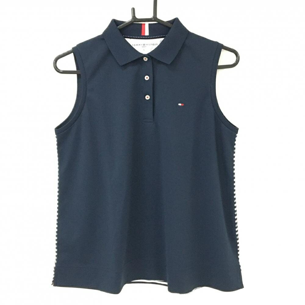 商品説明 ブランド Tommy Hilfiger Golf アイテム ノースリーブポロシャツ 表記サイズ L ※海外サイズの場合もございます。必ず実寸サイズをご確認ください。 実寸サイズ 　身幅：約48cm　袖丈：約-cm　肩幅：約33cm　着丈：約57.5cm ※実寸サイズの採寸方法については、こちらをご覧ください。 ★実寸サイズは平台に平置きして外寸を測定しており、商品によっては若干の誤差が生じます。数cmの誤差は予めご了承くださいませ。 特徴・仕様 ロゴ刺しゅう 襟裏柄　 適応時期 夏 商品ランク A コメント 腹部糸引き小 商品ランク（ゴルフウェア） N 新品（タグ付き) S 新品未使用品（タグなし） A+ 使用感や汚れ等がない、または目立たない綺麗な中古品 A 使用感や汚れ等が少ない美品や良品 B+ 使用感や中小の汚れ等がある一般的な中古品 B 使用感や大中の汚れ等がある一般的な中古品 C 使用感や大中の汚れ、小さな穴等がある中古品 商品ランク（ゴルフシューズ） N 新品（タグ付き) S 新品未使用品（タグなし） A+ しわや汚れ等がない、または少ない綺麗な中古品 A しわや小さな汚れはあるが、使用感が少ない美品や良品 B+ しわや中小の汚れ、使用感がある一般的な中古品 B しわや大中の汚れ、使用感がある一般的な中古品 C しわや大中の汚れ、使用感がある中古品 D しわや大きな汚れ、使用感がある中古品 &nbsp;★A+～CランクはUSED品となりますので、神経質な方はご入札をお控えください。 &nbsp;★Nランクは新品商品ですが、一部保管時による汚れ等があります。商品説明や写真で必ずご確認ください。　
