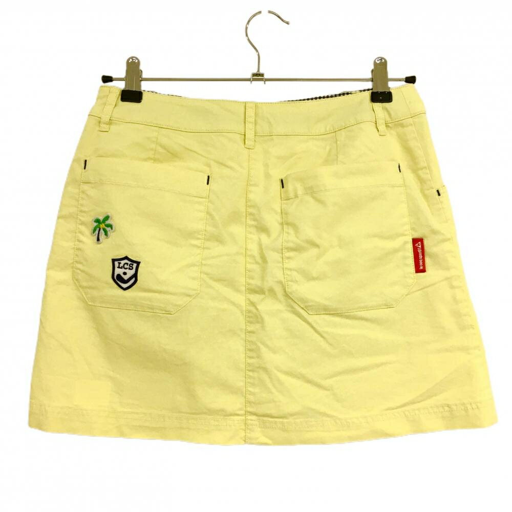ルコックゴルフ スカート ライトイエロー 内側パンツ ワッペン ヤシの木 レディース 9 ゴルフウェア le coq sportif