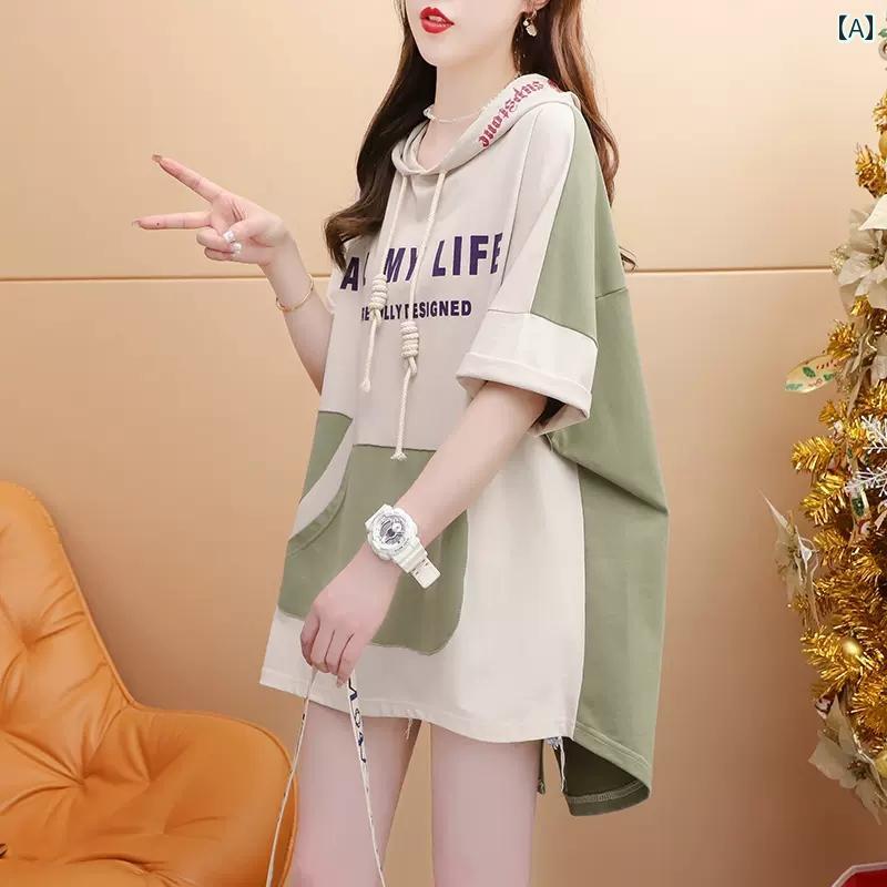 プラス サイズの 女性の フード 付き コント ラスト カラー 半袖 T シャツ 女性の 夏 服 2024 新しい 緩い ミドル 丈のお 尻を カバー する トップ トレンディのサムネイル