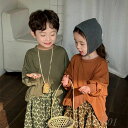 春の新作子供用不規則な長袖Tシャツ、メンズとレディースのベビースリットスプライシングスウェットシャツトレンディ