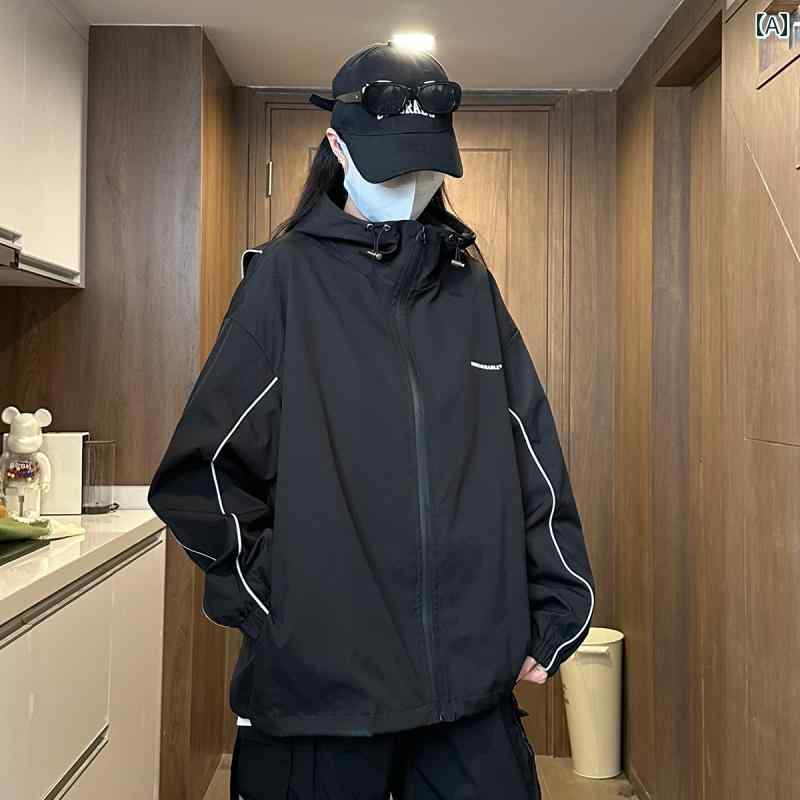 2025年の新作、男女兼用の機能的なゆったりとしたキャンプ用防水ブルゾン。